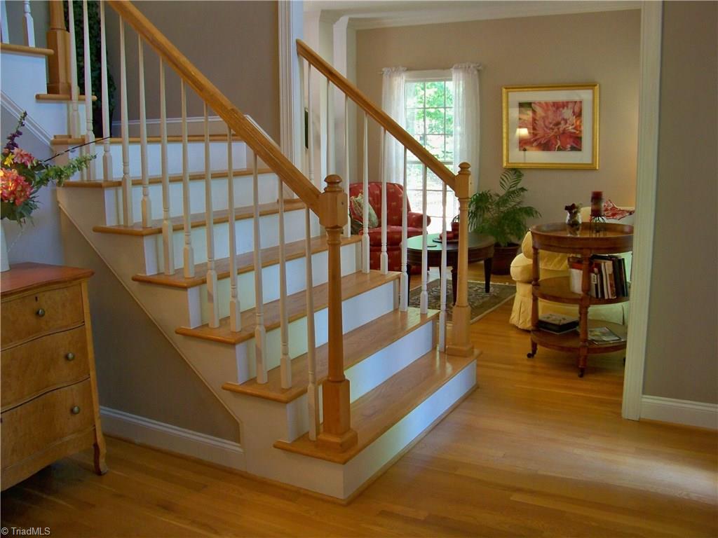 5805 Autumn Gate Drive Oak Ridge, NC 27310 - Photo 12 of 30 This home was built with some expensive upgrades - the extra wide staircase with oak treads is one....