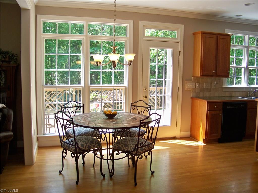 5805 Autumn Gate Drive Oak Ridge, NC 27310 - Photo 15 of 30 Breakfast area is much larger than it appears - what a pretty room to eat breakfast or work on your laptop!