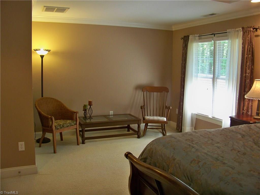 5805 Autumn Gate Drive Oak Ridge, NC 27310 - Photo 18 of 30 Sitting area offset in master...great place for a couch!