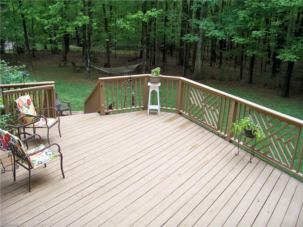 5805 Autumn Gate Drive Oak Ridge, NC 27310 - Photo 28 of 30 Expansive deck affords lots of room for entertaining!