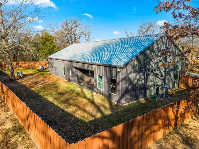 a view of residential houses with outdoor space