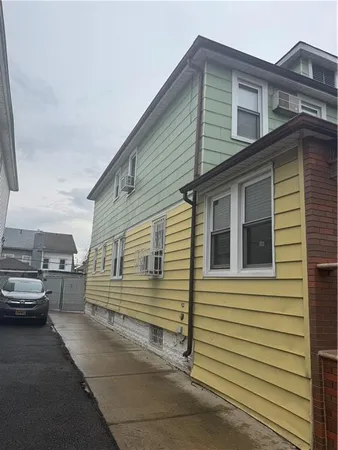 a view of a house with a street