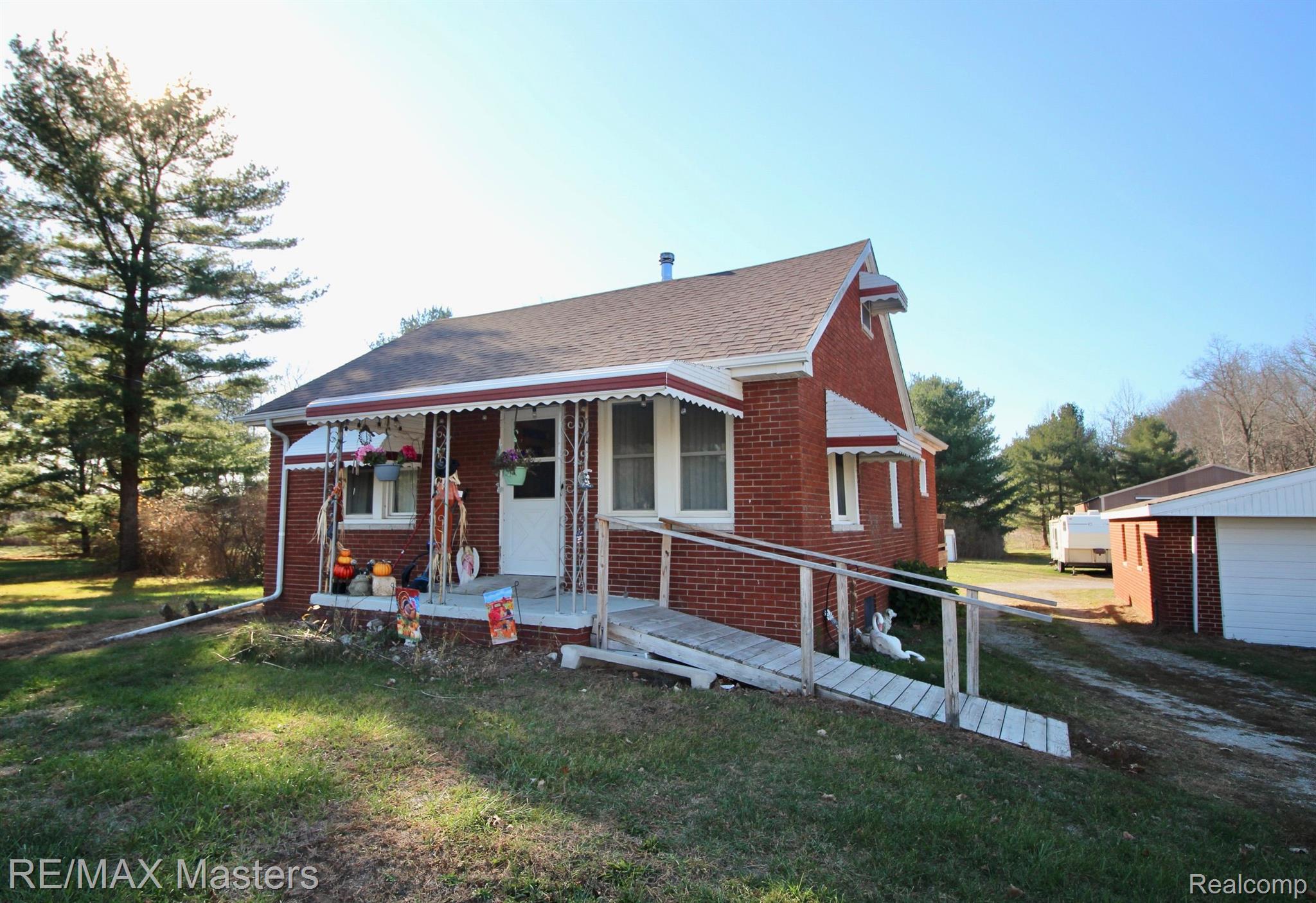 12527 Sumpter Road Carleton, MI 48117 - Photo 2 of 33 Solid 2 bed / 1 bath sits along 1110' of frontage!