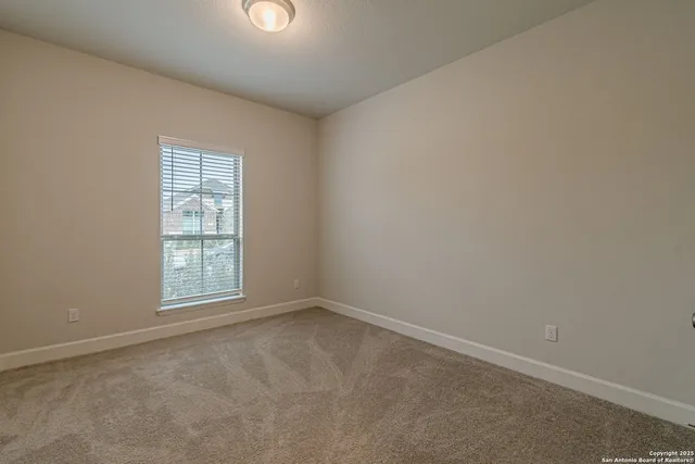 an empty room with a window