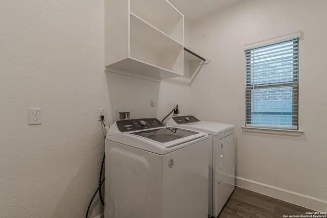 a utility room with dryer and washer