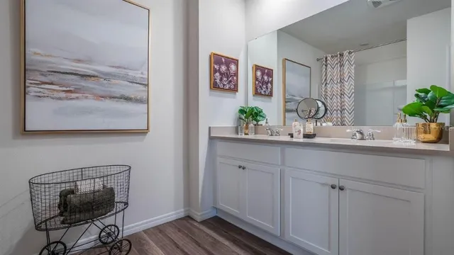a room with cabinets and wooden floor