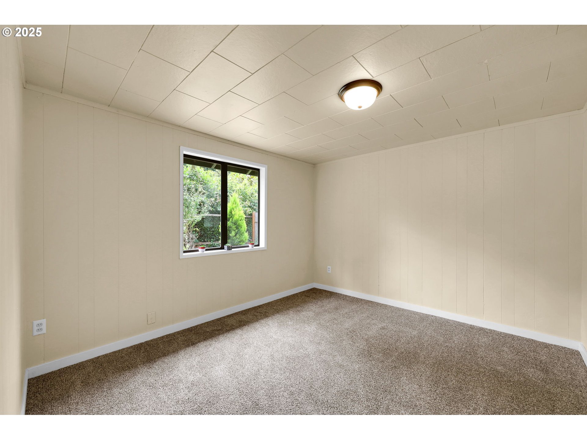 2785 Riverview Street Eugene, OR 97403 - Photo 17 of 44 a view of an empty room with a window