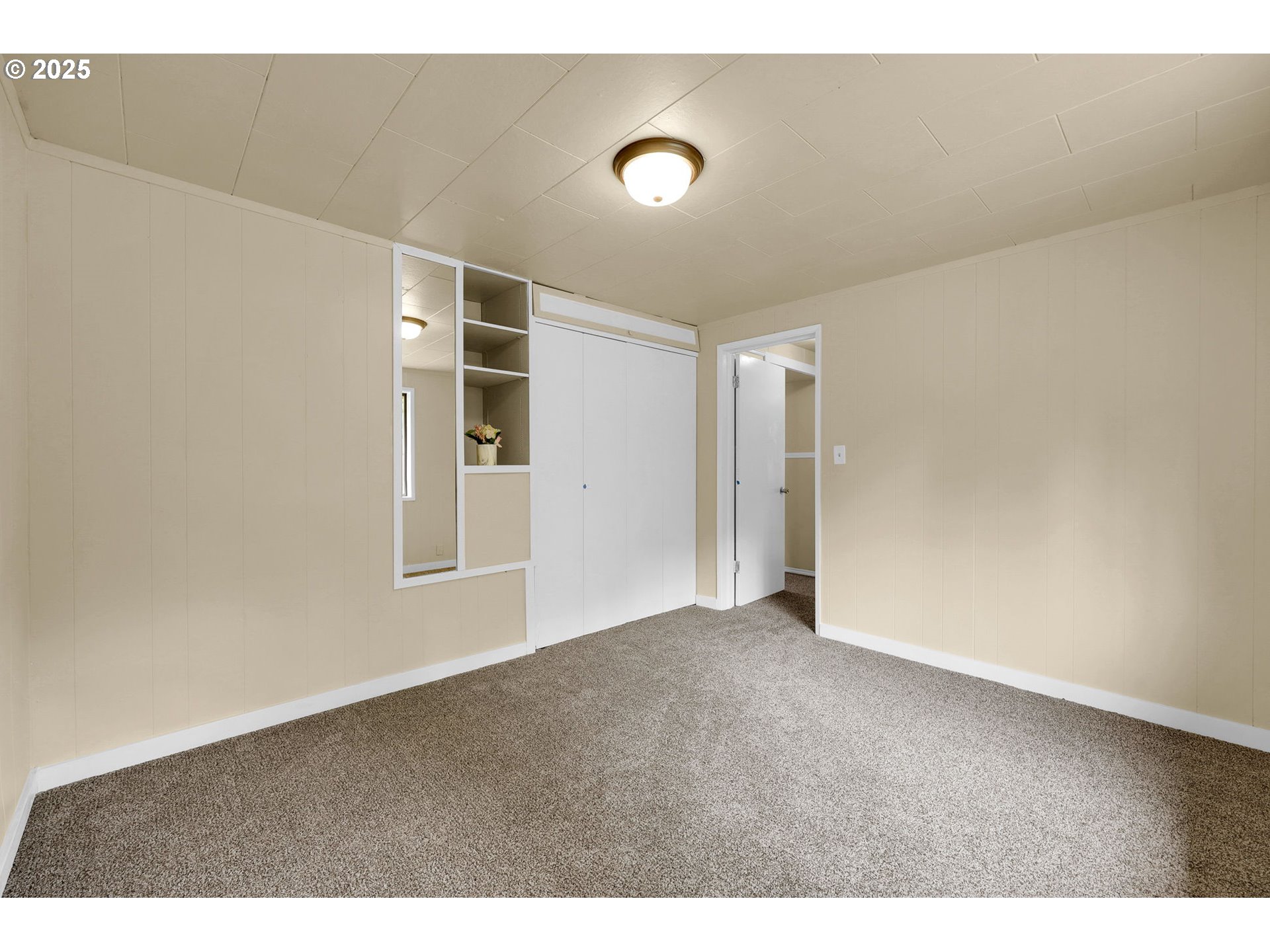 2785 Riverview Street Eugene, OR 97403 - Photo 19 of 44 a view of an empty room with a window