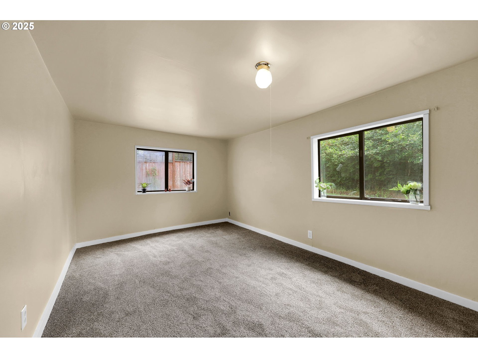 2785 Riverview Street Eugene, OR 97403 - Photo 29 of 44 a view of an empty room with a window