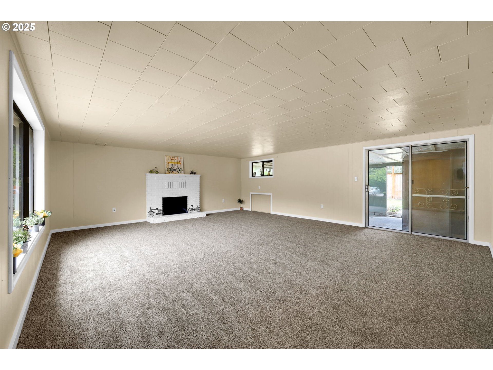 2785 Riverview Street Eugene, OR 97403 - Photo 3 of 44 a view of empty room with fireplace