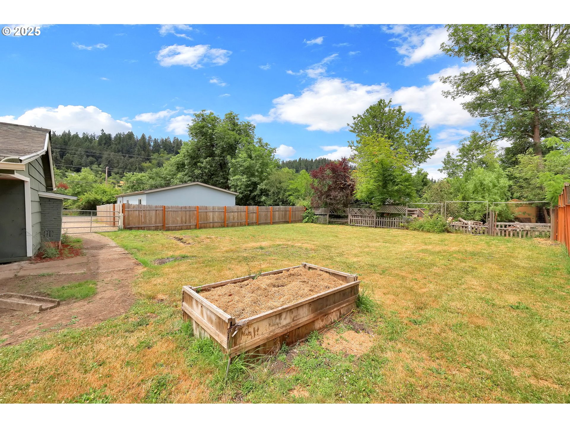 2785 Riverview Street Eugene, OR 97403 - Photo 33 of 44 a view of a swimming pool with an outdoor space and seating area