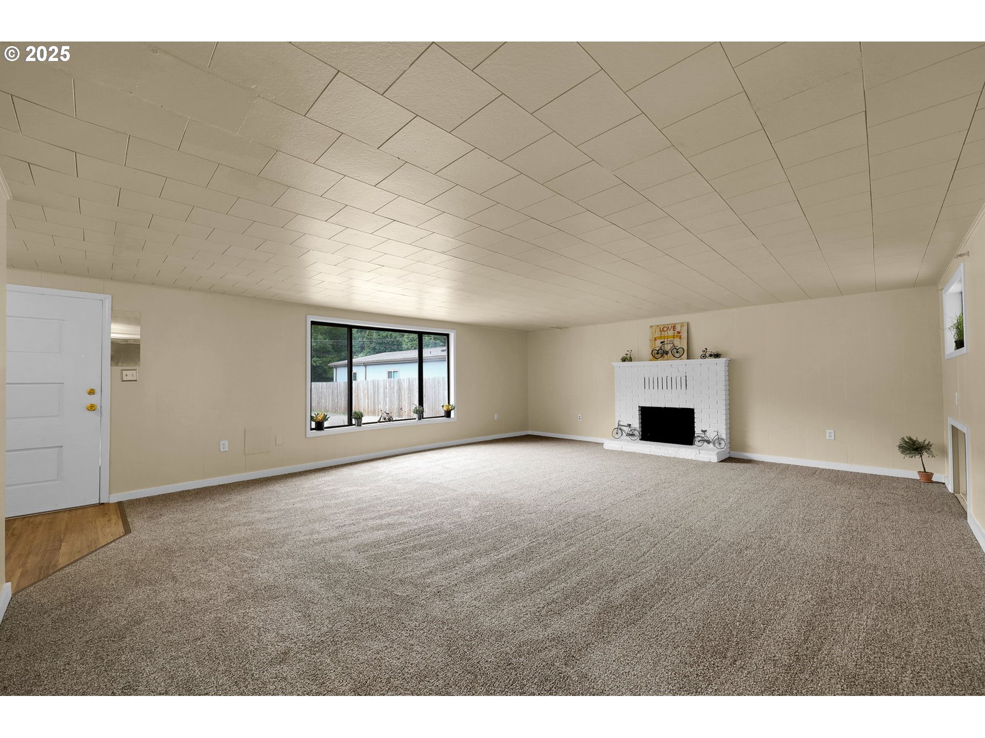 2785 Riverview Street Eugene, OR 97403 - Photo 4 of 44 a view of empty room with a fireplace