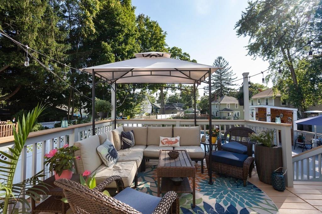 27 Hadwen Road Worcester, MA 01602 - Photo 22 of 27 a patio with hardwood table and chairs