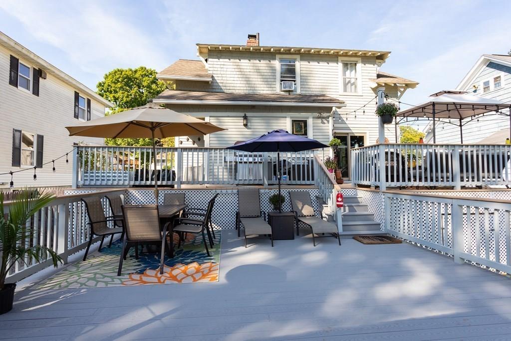 27 Hadwen Road Worcester, MA 01602 - Photo 23 of 27 a view of a patio with a table and chairs