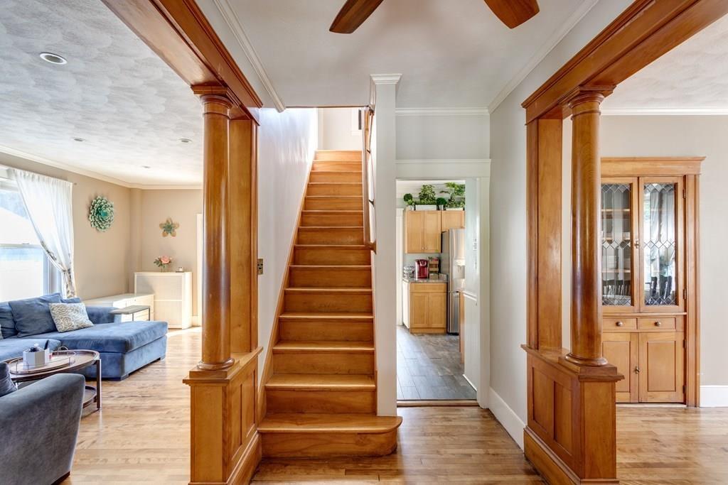 27 Hadwen Road Worcester, MA 01602 - Photo 9 of 27 a view of a hallway with wooden floor and staircase