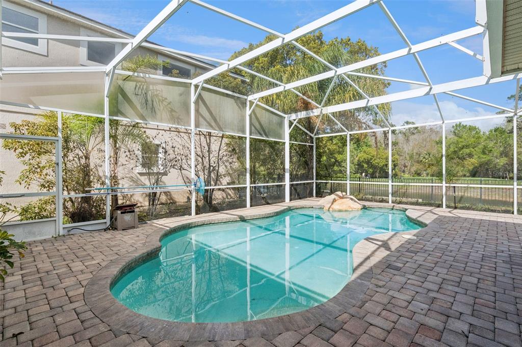 2541 Teton Stone Run Orlando, FL 32828 - Photo 54 of 82 a view of a house with a backyard