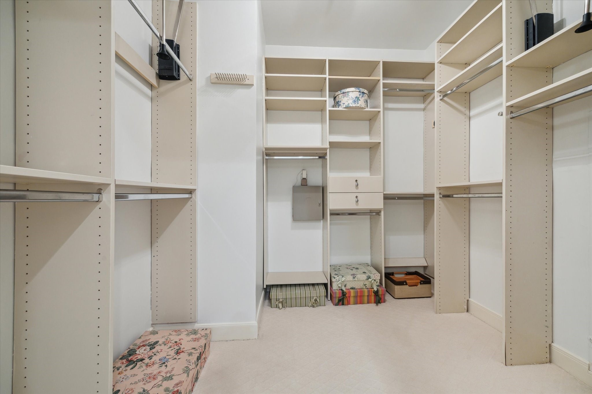 2902 West Lane, Unit A Houston, TX 77027 - Photo 17 of 23 a view of walk in closet with clothes and shoes