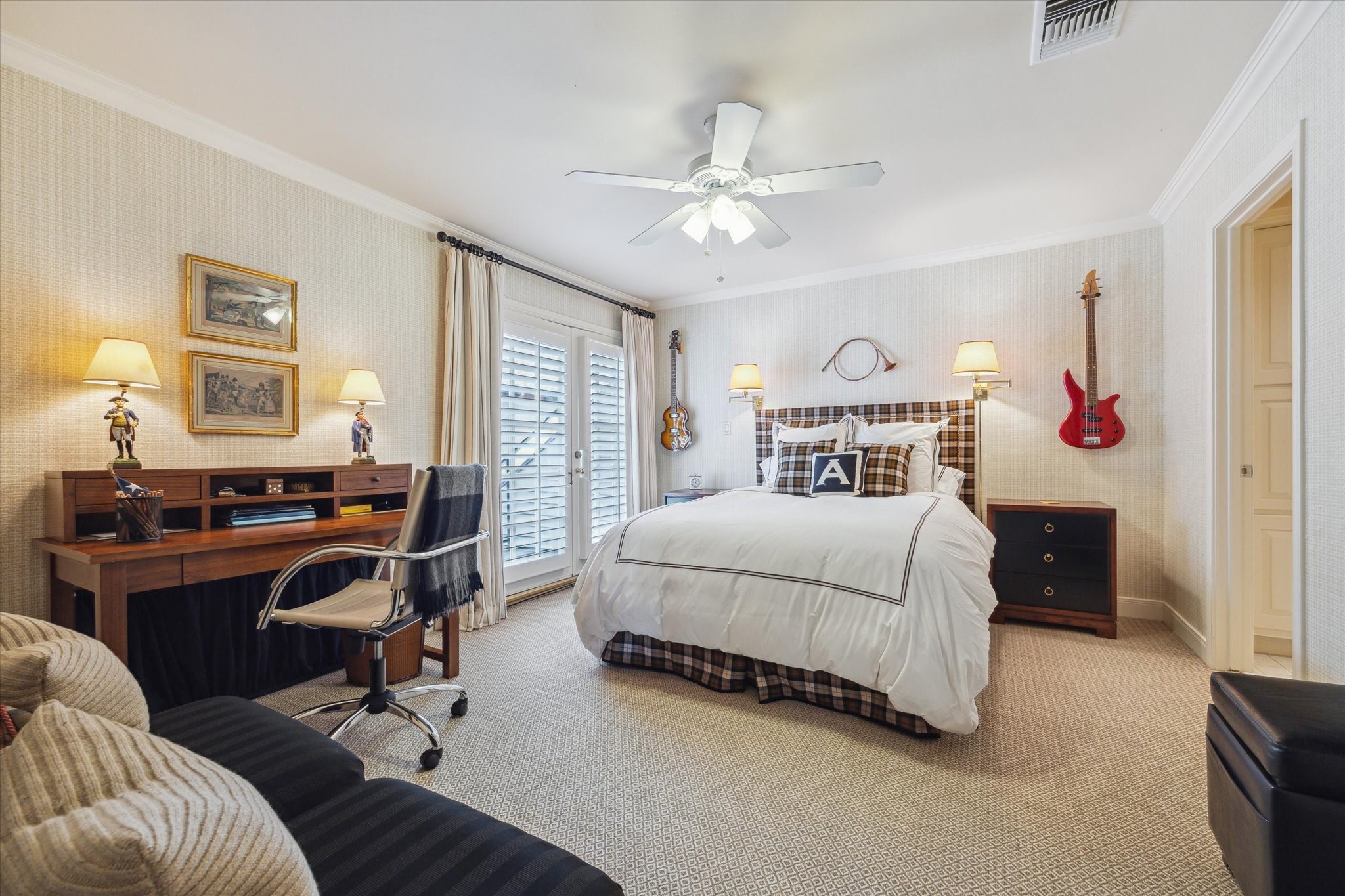 2902 West Lane, Unit A Houston, TX 77027 - Photo 19 of 23 a bedroom with a bed gym equipment and a desk