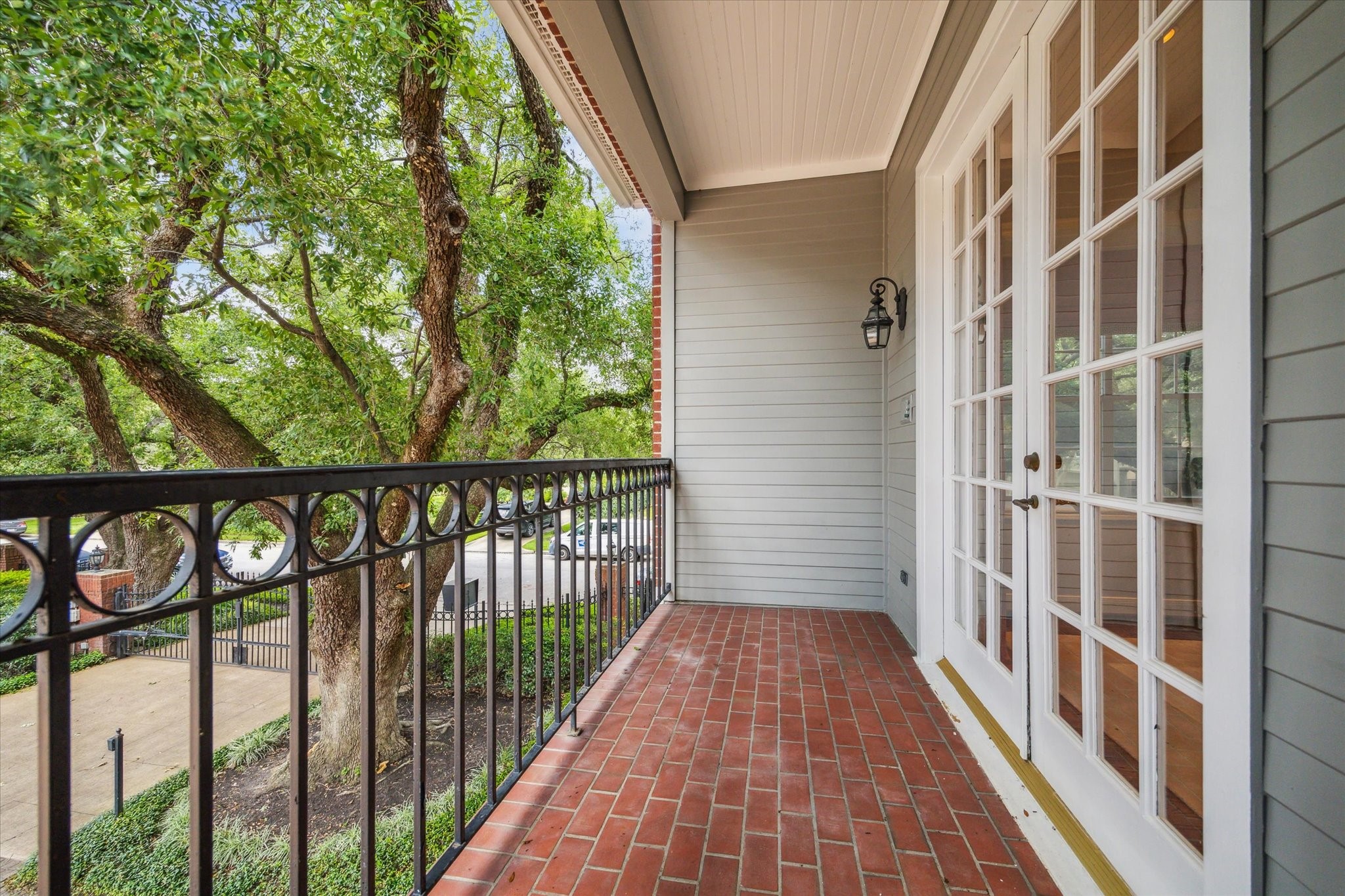 2902 West Lane, Unit A Houston, TX 77027 - Photo 23 of 23 a view of a balcony with wooden floor