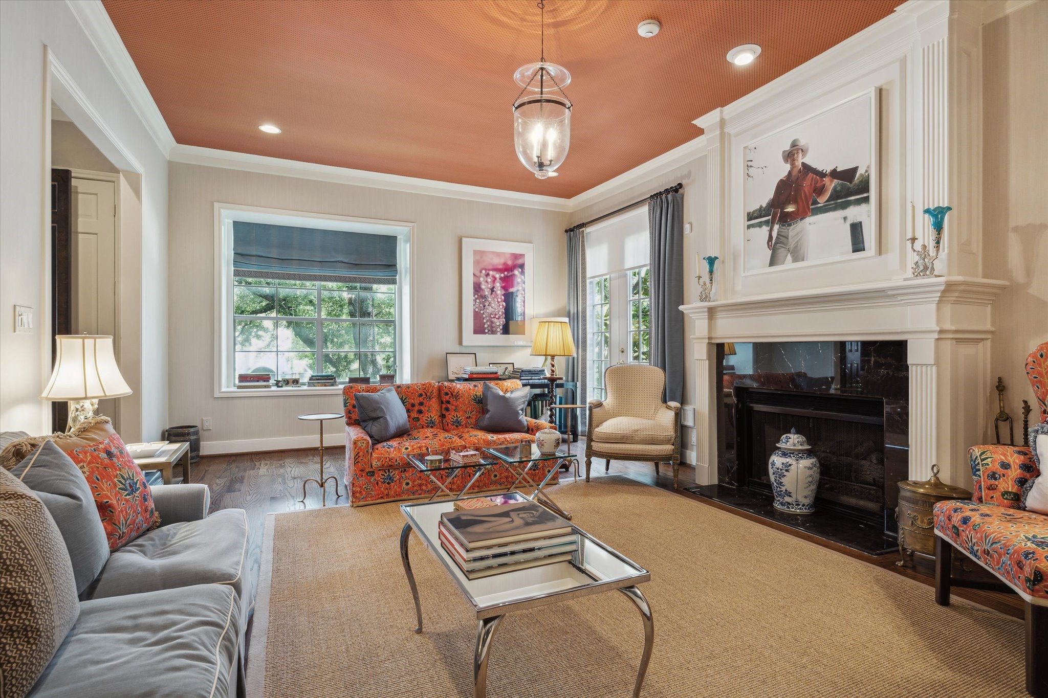2902 West Lane, Unit A Houston, TX 77027 - Photo 4 of 23 a living room with furniture a fireplace and a large window