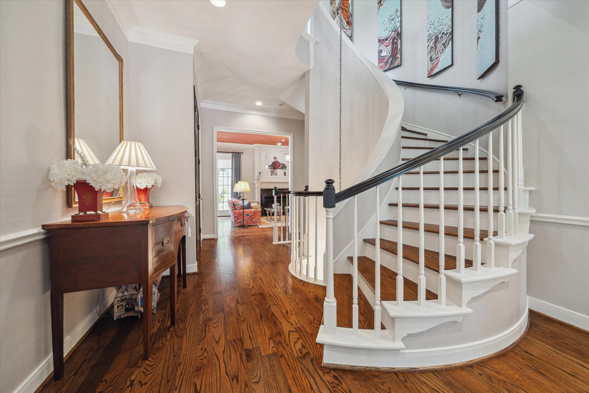 2902 West Lane, Unit A Houston, TX 77027 - Photo 6 of 23 a view of entryway and hall with wooden floor