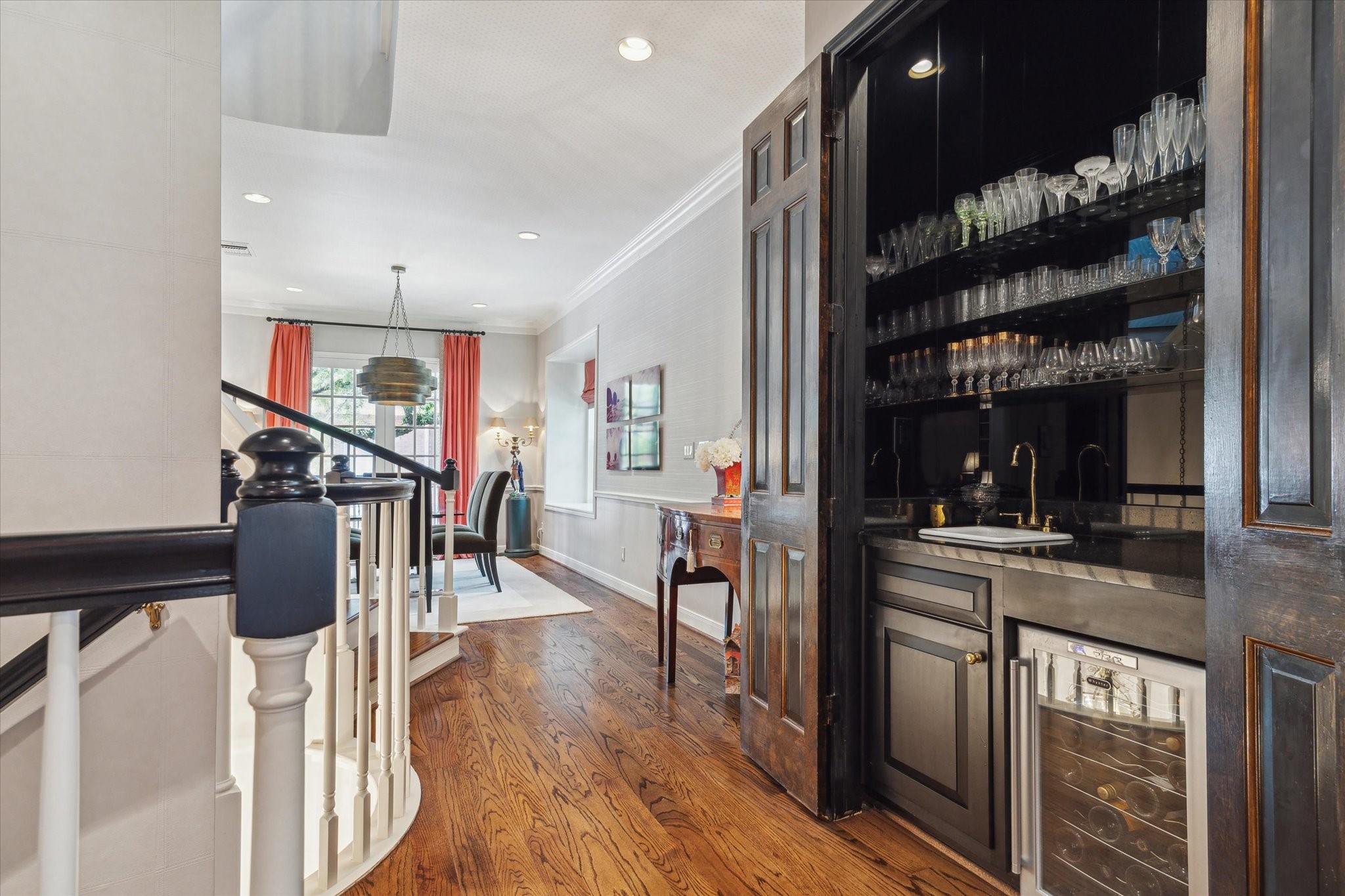 2902 West Lane, Unit A Houston, TX 77027 - Photo 8 of 23 a view of a kitchen with furniture and wooden floor