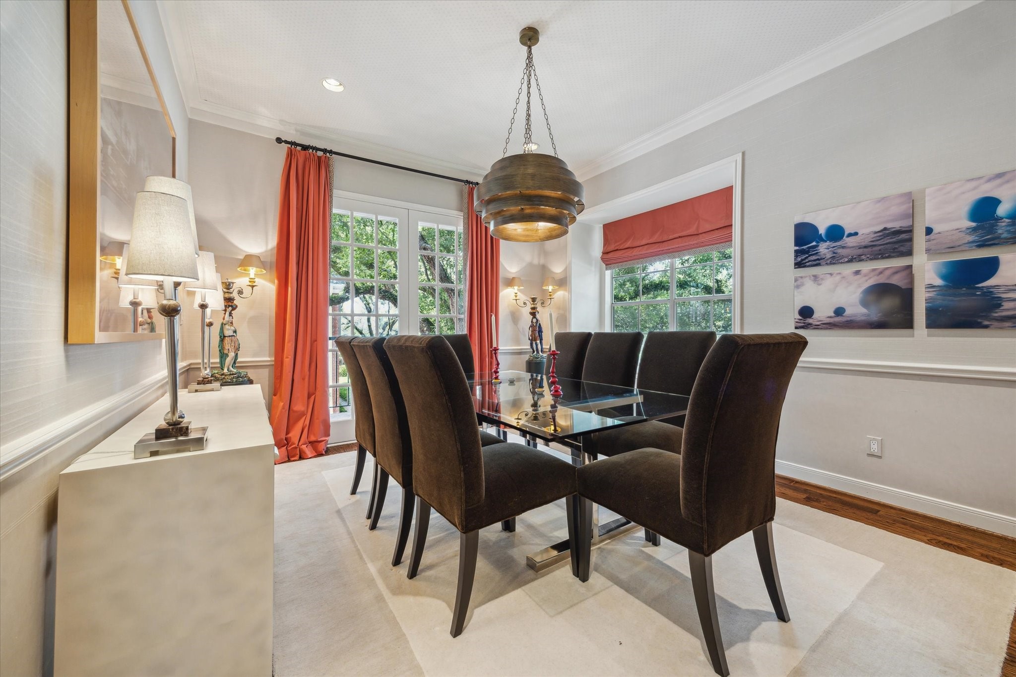2902 West Lane, Unit A Houston, TX 77027 - Photo 9 of 23 a dining room with furniture a chandelier and wooden floor