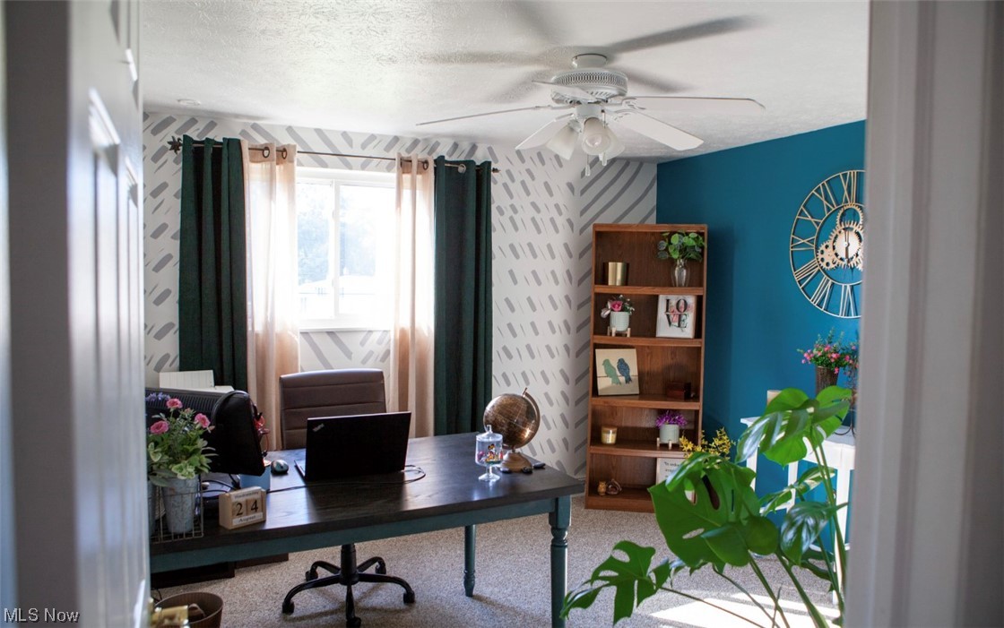 519 Button Road Bedford, OH 44146 - Photo 14 of 26 Carpeted home office featuring a textured ceiling and ceiling fan