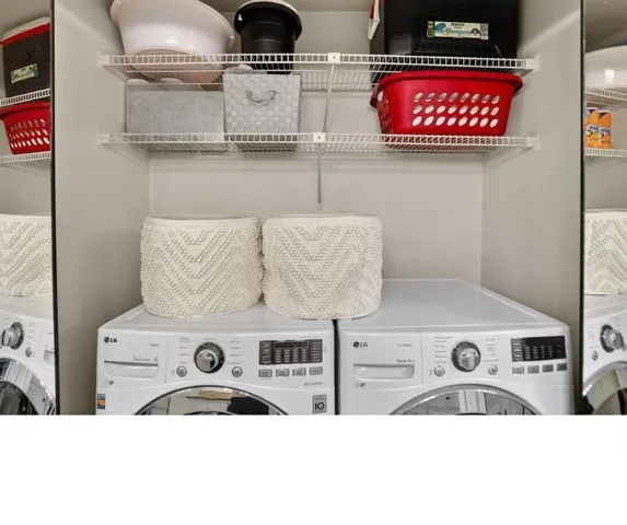 a black and white photo of a kitchen