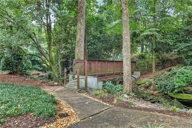 a garden view with a seating space