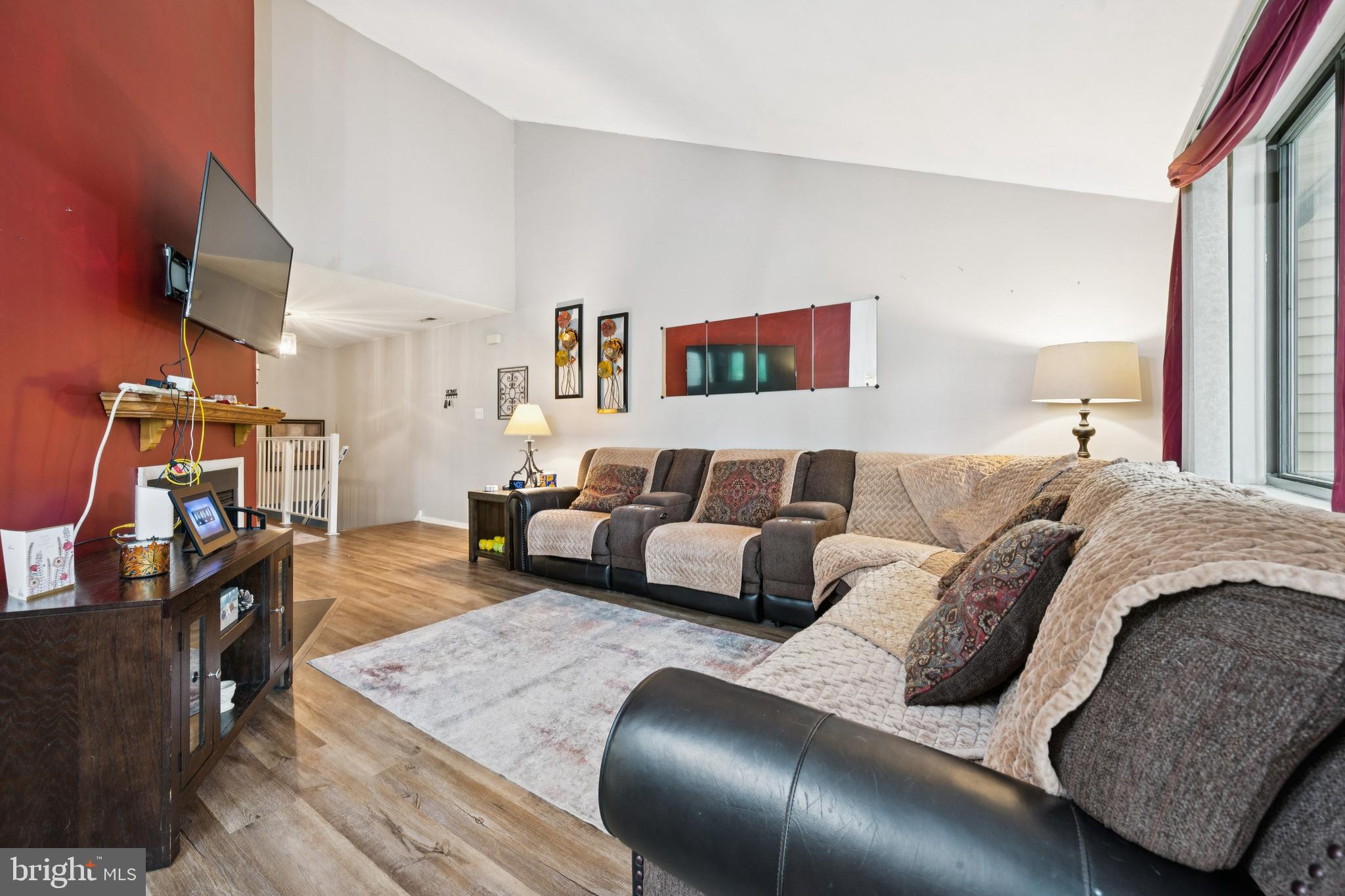 105 B Cypress Point Circle Mount Laurel, NJ 08054 - Photo 13 of 24 a living room with furniture and a flat screen tv