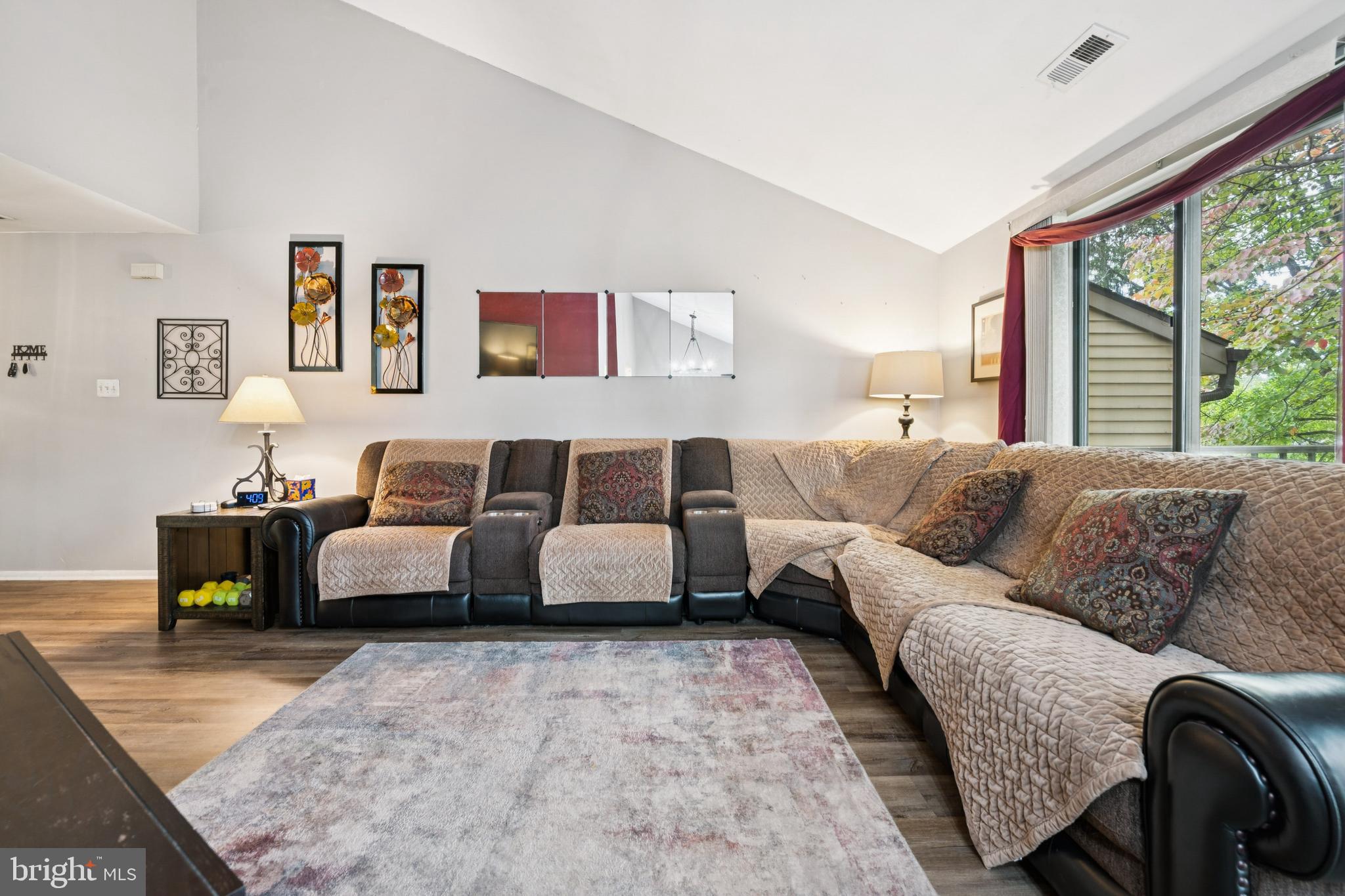 105 B Cypress Point Circle Mount Laurel, NJ 08054 - Photo 14 of 24 a living room with furniture and large windows