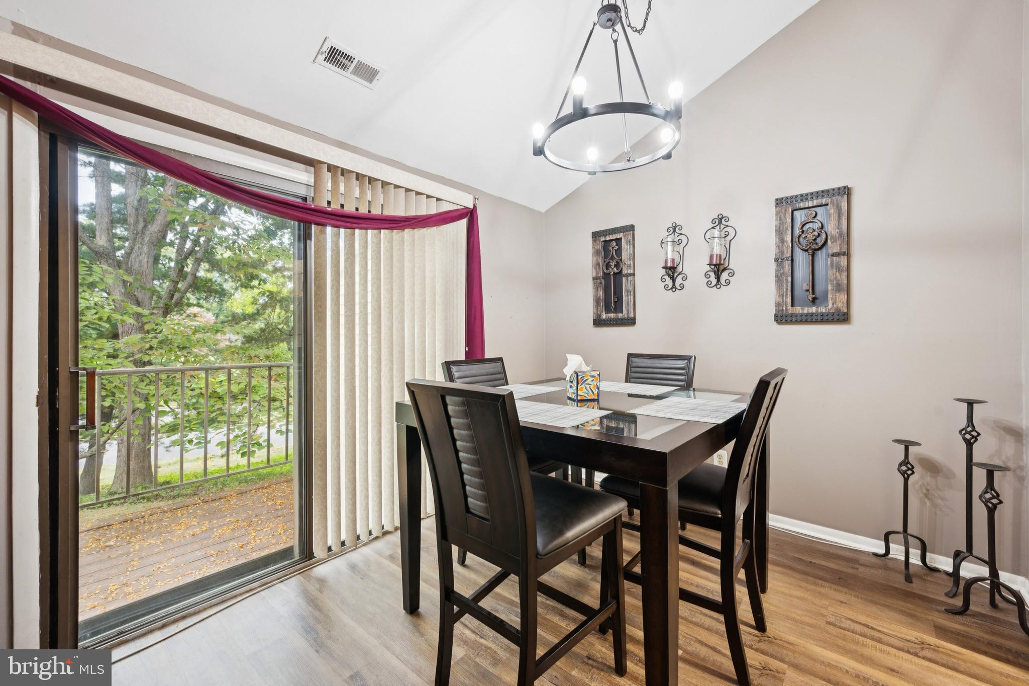 105 B Cypress Point Circle Mount Laurel, NJ 08054 - Photo 15 of 24 a view of a dining room with furniture window and wooden floor