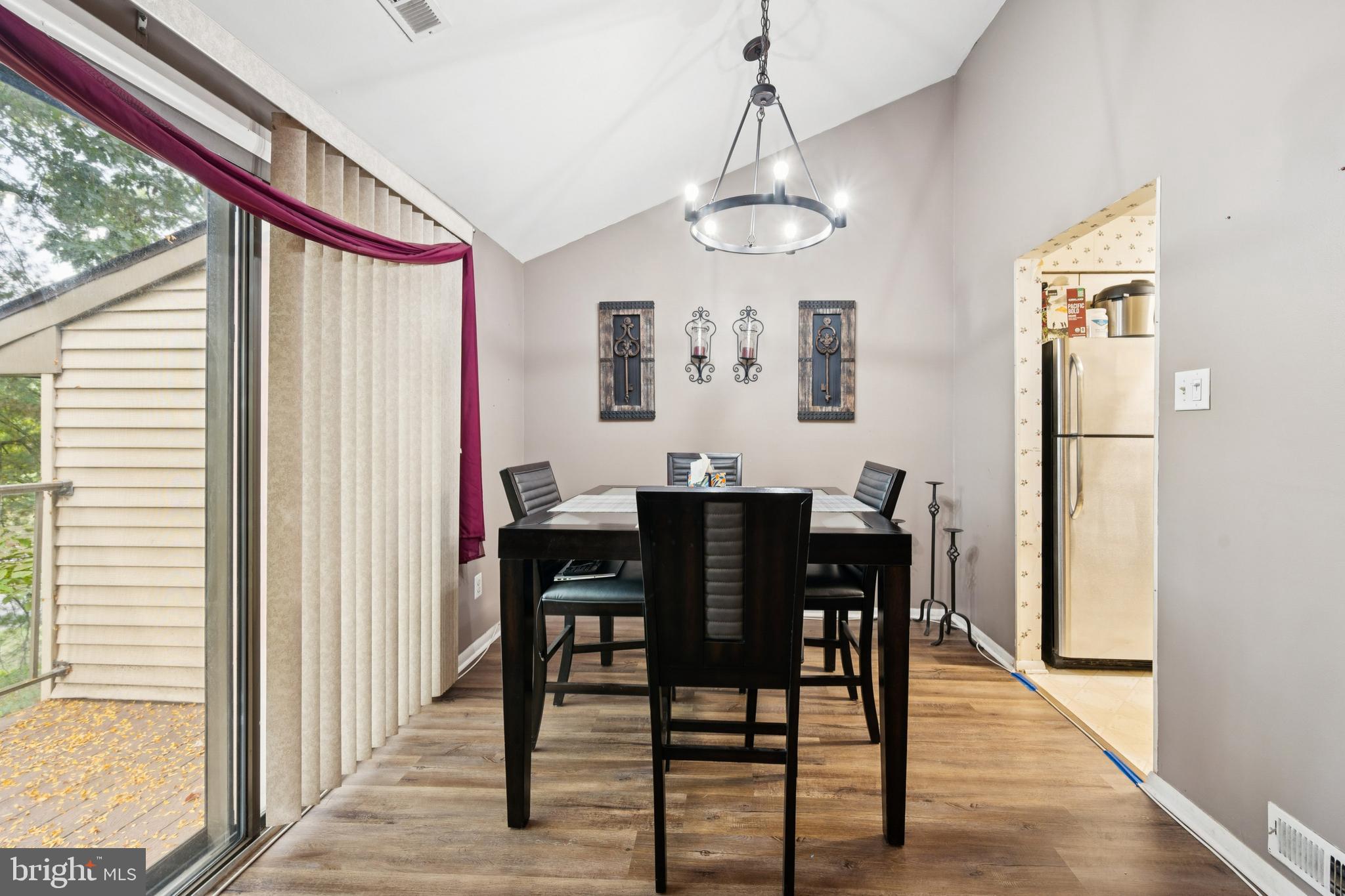 105 B Cypress Point Circle Mount Laurel, NJ 08054 - Photo 16 of 24 a view of a dining room with furniture window and wooden floor