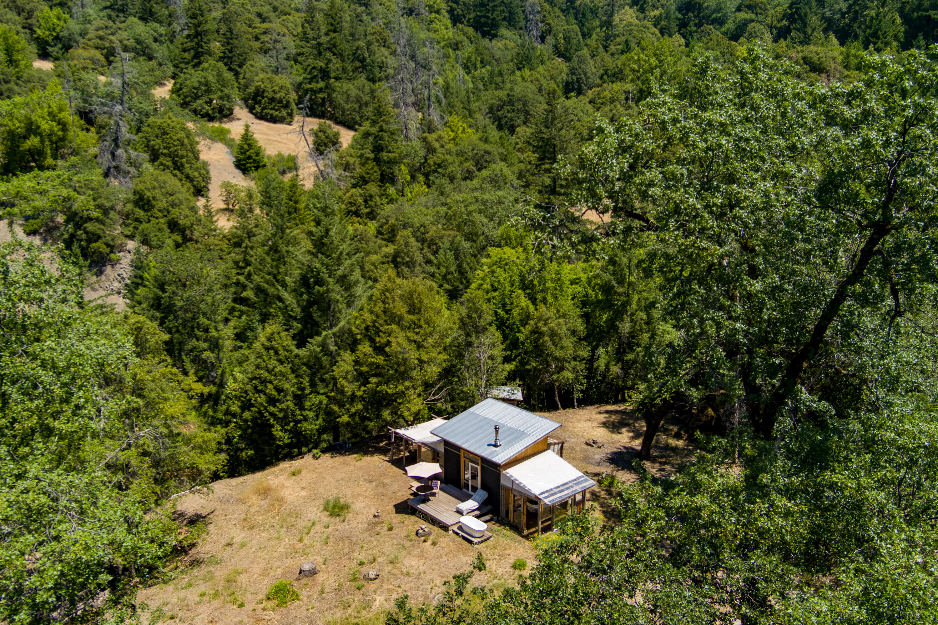 60890 Bell Springs Road Laytonville, CA 95454 - Photo 35 of 77 a view of a yard with a bench