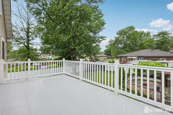 a view of a street from a balcony