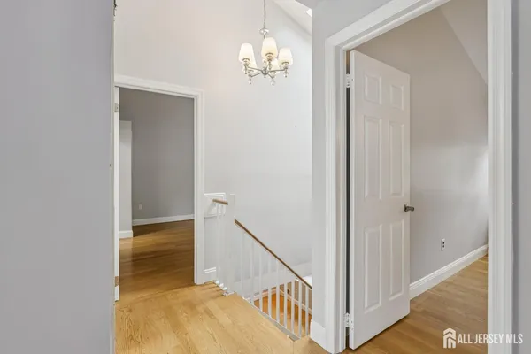 a view of a hallway view with staircase