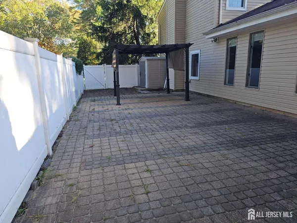 a view of a house with a street