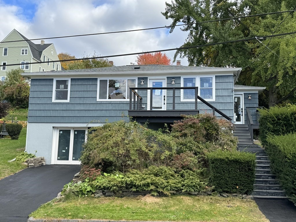10 Proctor Street Worcester, MA 01606 - Photo 8 of 31 a front view of a house with a yard