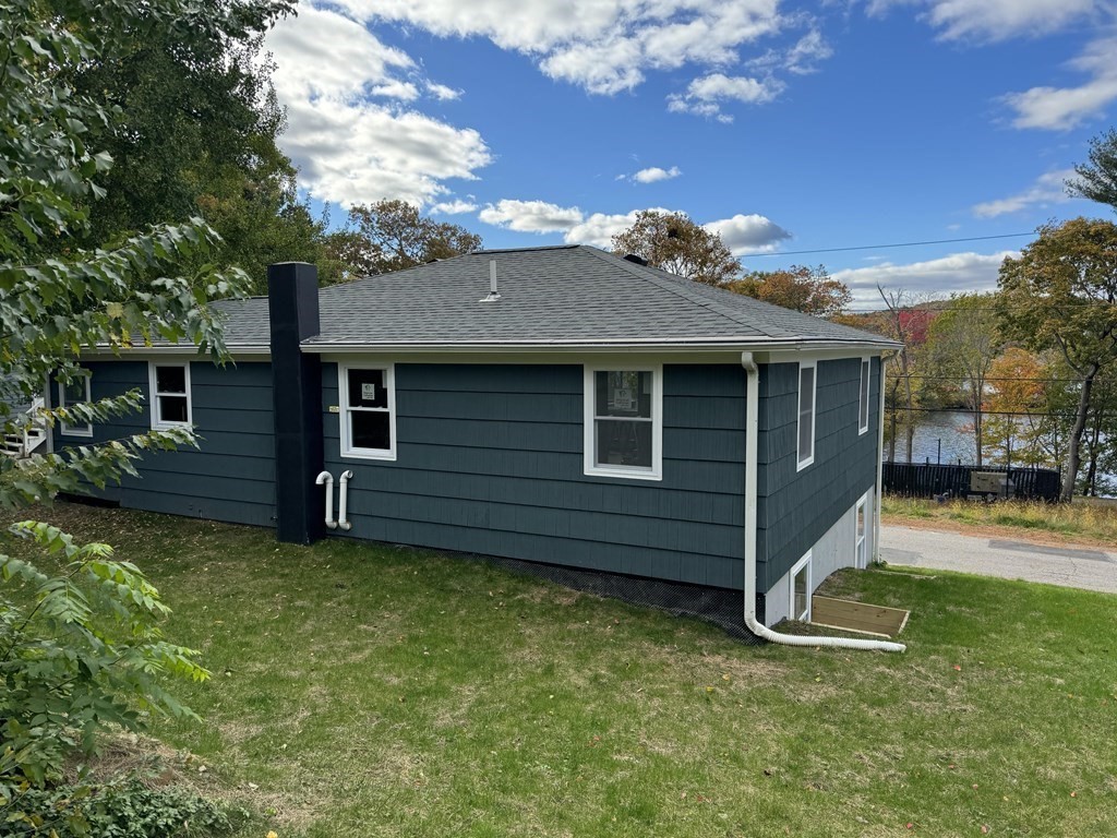 10 Proctor Street Worcester, MA 01606 - Photo 10 of 31 a view of a house with a backyard