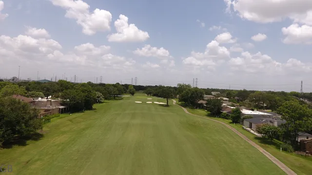 a view of a lake and green space