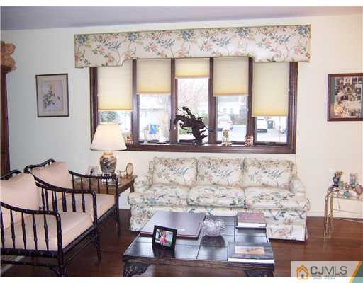 638 New Dover Road Colonia, NJ 07067 - Photo 7 of 23 a view of entryway and hall with wooden floor