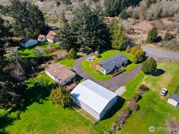 an aerial view of a house with a garden