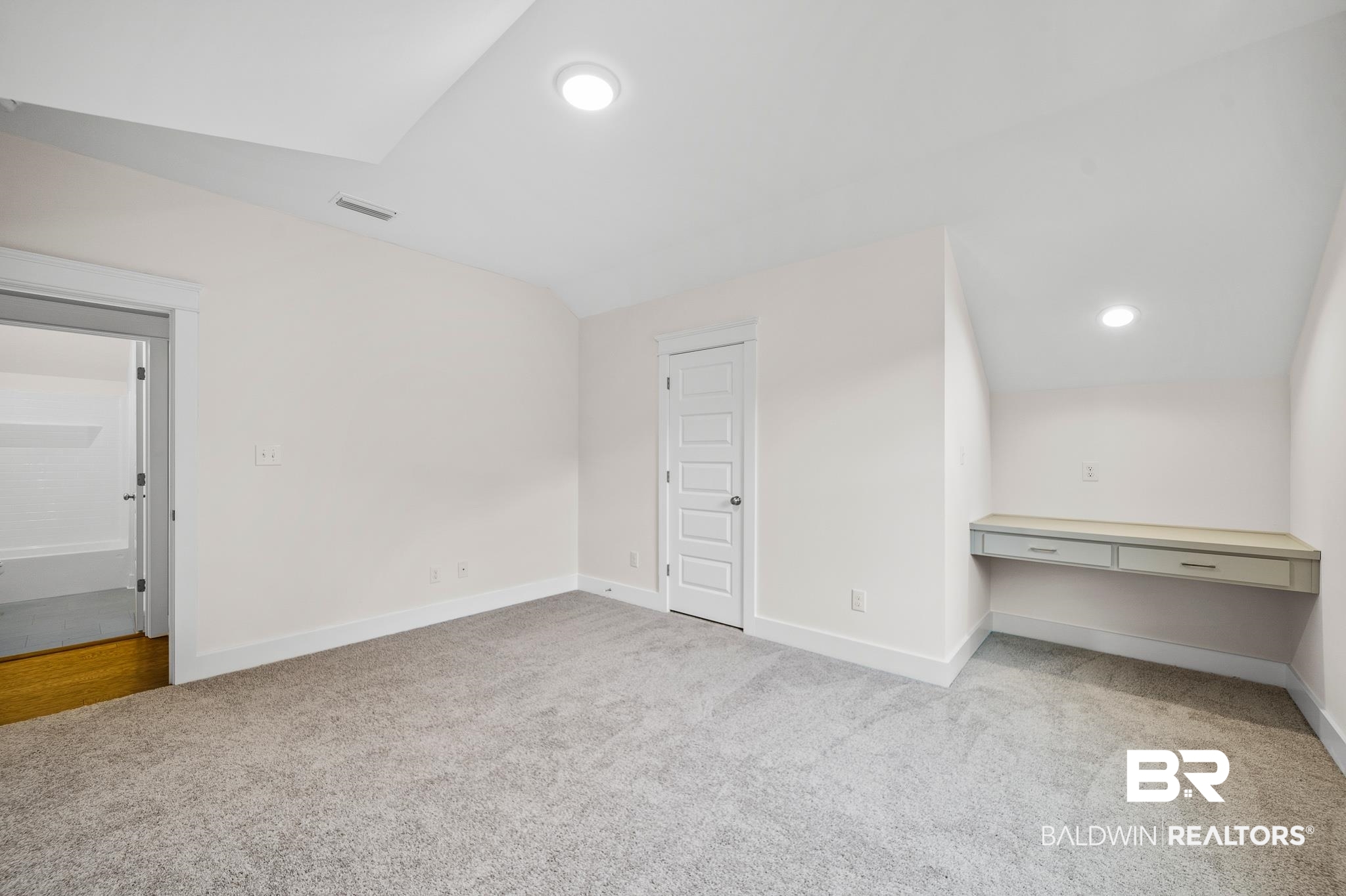 29 Signal Hill Road Daphne, AL 36527 - Photo 26 of 36 Interior space with light carpet and vaulted ceiling