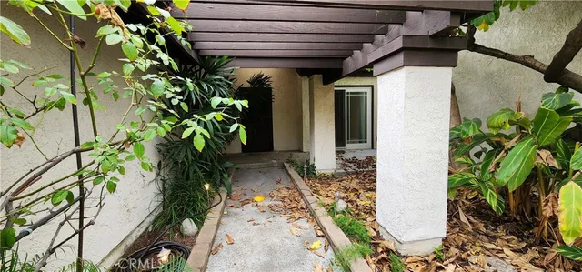 a plant is in front of a house