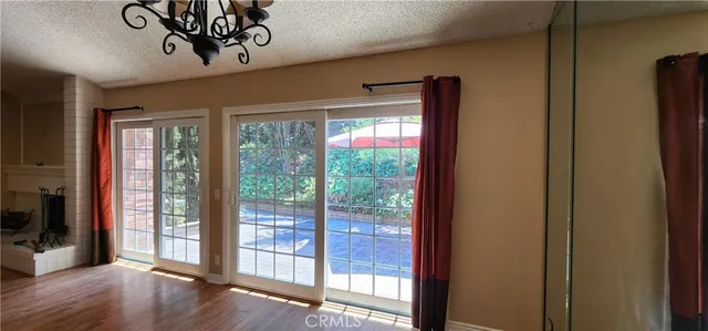 a view of an empty room with a balcony