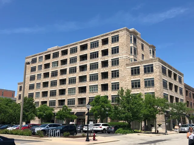 a front view of a building with street view