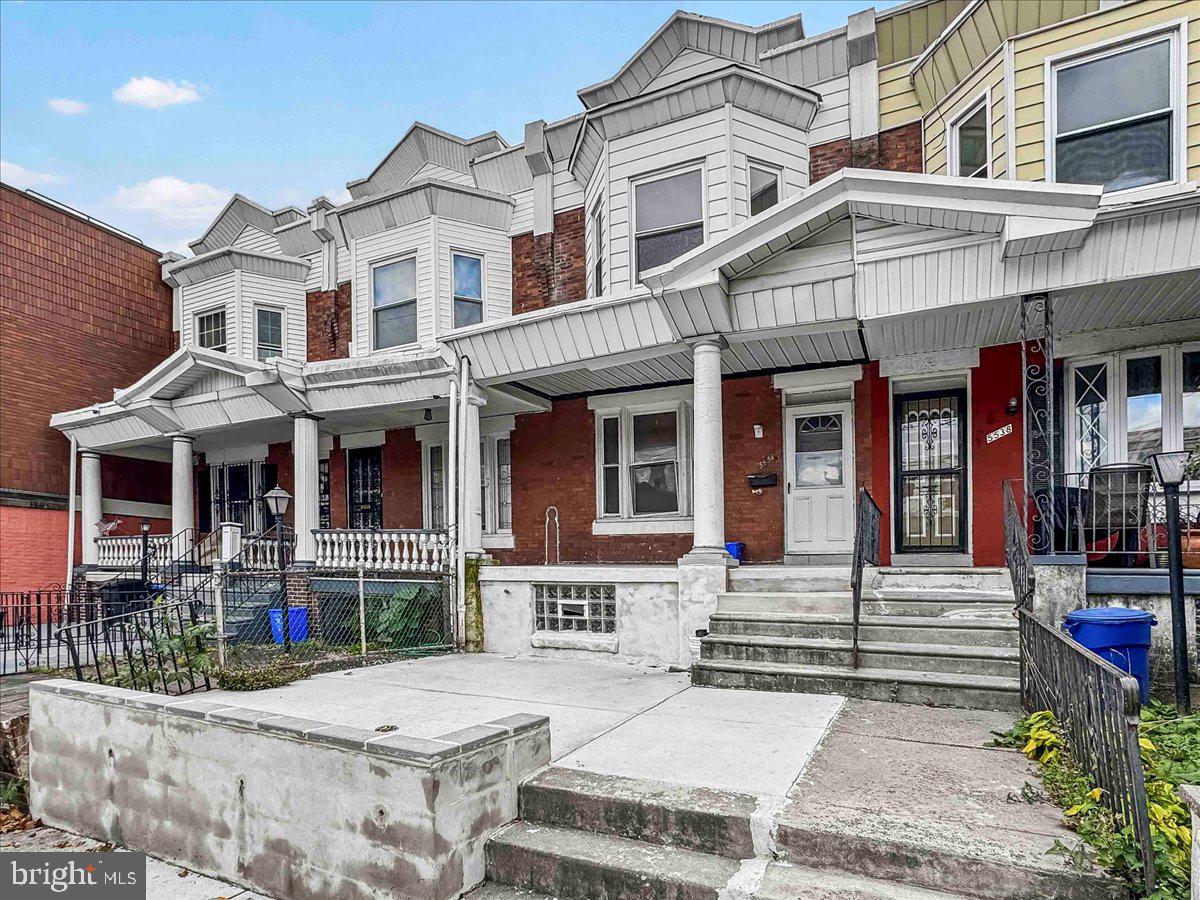 5536 Pine Street Philadelphia, PA 19143 - Photo 1 of 32 front view of a building with a yard