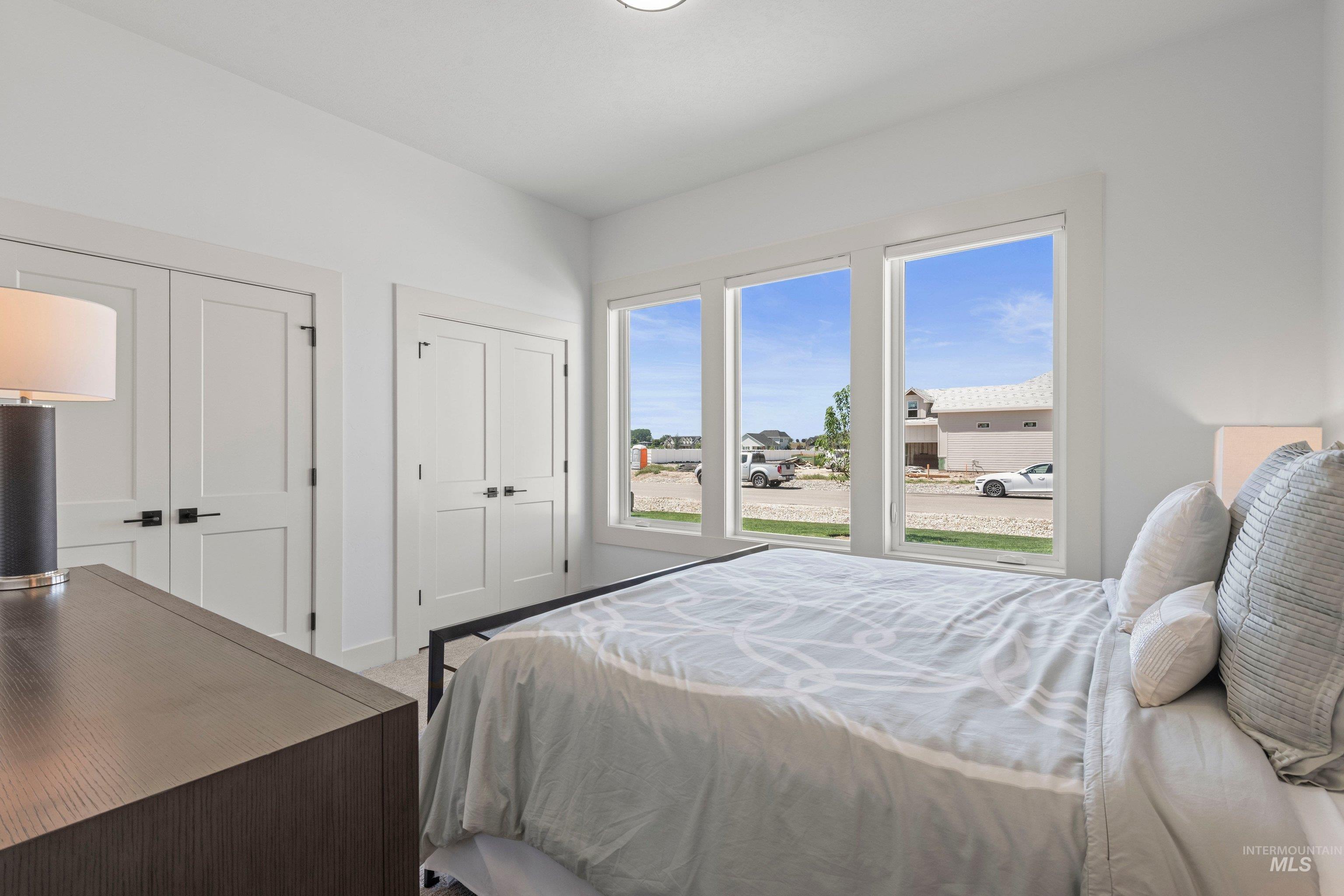 24990 Belgian Way Middleton, ID 83644 - Photo 29 of 50 Bright interior space featuring three large windows