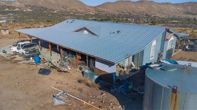 a view of a house with a roof deck